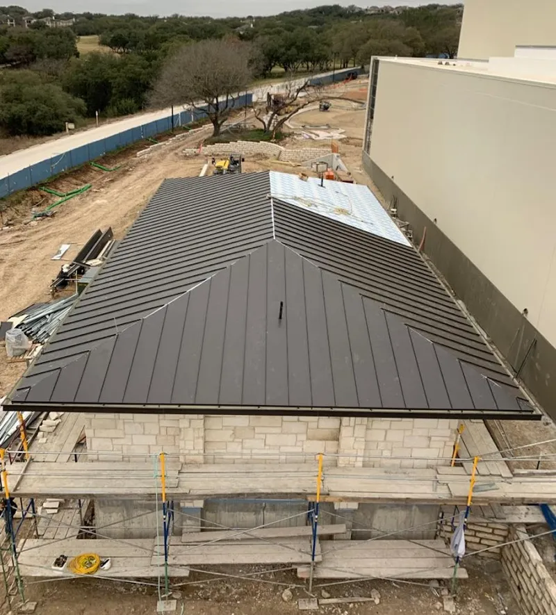 Metal roof new construction with scaffolding in Du Quoin